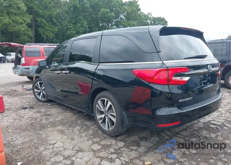 2021 Honda Odyssey Touring z USA, uszkodzony, nr VIN 5FNRL6H82MB028272